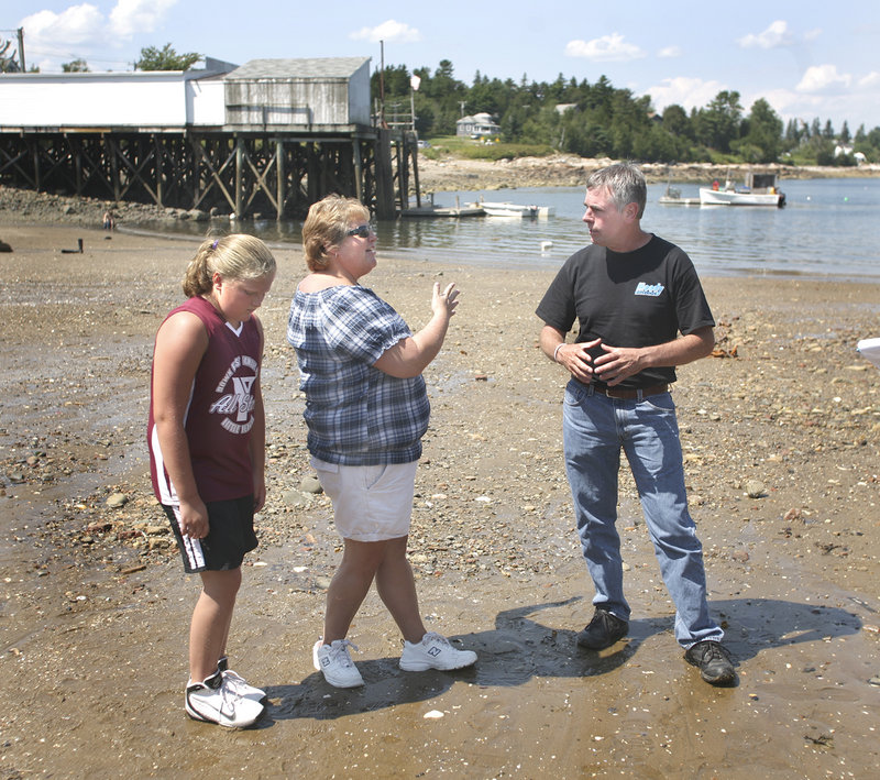 Shawn Moody, running as an independent, stops on his statewide travels to talk with Annie Perry and her daughter Maggie of Gouldsboro Point in Prospect Harbor on Friday.