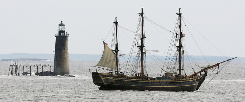 The H.M.S. Bounty motors past Ram Island Ledge Light on the way to Boothbay Harbor for restoration work in 2006. If the lighthouse is sold, the Coast Guard will continue to maintain the navigational aids – the light and the foghorn.