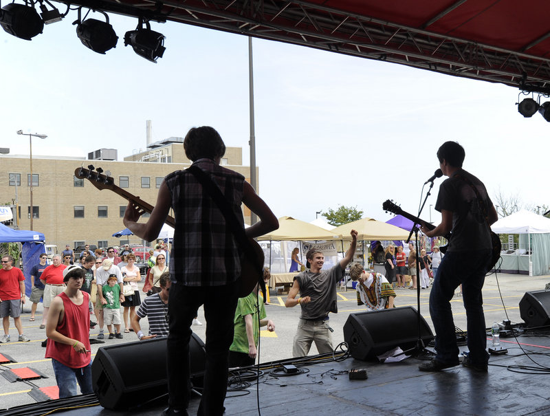 The band Phantom Companion from the Maine Academy of Modern Music plays at the Portland Music and Arts Festival along Free Street in Portland on Saturday. Performers included other students and faculty from the academy, the Jason Spooner Trio, Pete Miller, Grant Street Orchestra, Samuel James and Carbon Leaf.
