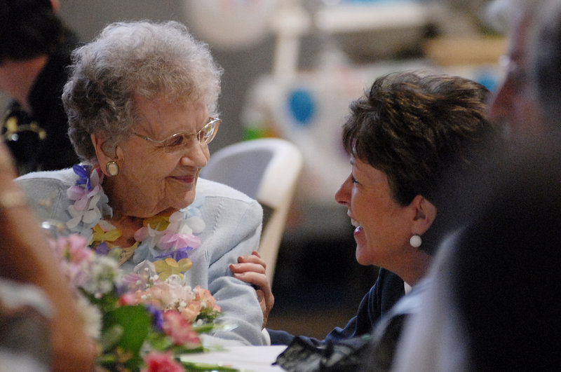 Cora Brown talks with U.S. Sen. Susan Collins, R-Maine, during Browns surprise 100th birthday party in Portland on Saturday.Shawn Patrick Ouellette/Staff Photographer