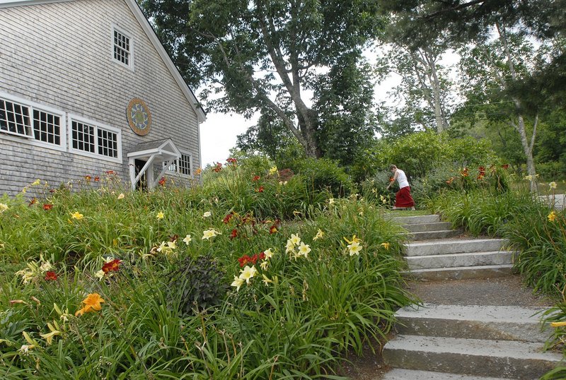 A customer heads for the barn at Cellardoor Winery. The 200-year-old post-and-beam structure was renovated after Cellardoor owner Bettina Doulton bought the property in Lincolnville, about five miles from Camden, in 2007.