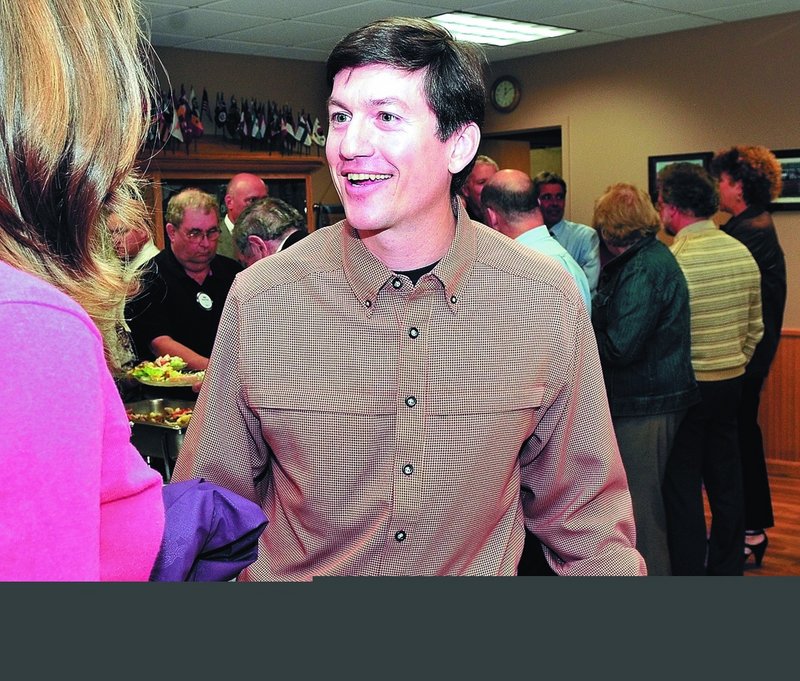 Independent gubernatorial candidate Kevin Scott meets with members of the Waterville Rotary Club at the Alfond Youth Center, where he spoke to about 60 people Monday.