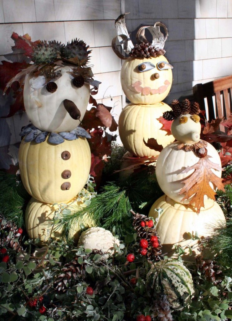 Amanda Russell outfits “pumpkin people” in leaves and other accoutrements at Coastal Maine Botanical Gardens.