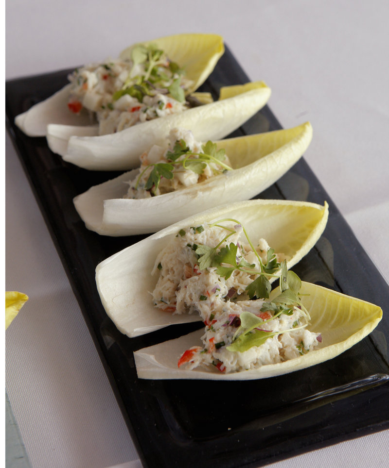 This apple and crab salad, made with local McIntosh apples, lightly dressed and served on endive, was prepared by Chef Mitchell Kaldrovich of Cape Elizabeth's Inn by the Sea for a preview of Harvest on the Harbor. Kaldrovich is one of 17 chefs who will be cooking for the Grand Tasting on the Harbor Oct. 21 at Ocean Gateway.