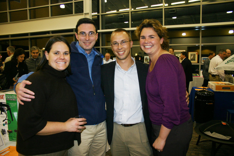 Chris Cameron and Aric Walton, who serve on the steering committee for STRIVE, with their wives Sarah Begin and Jess Walton.