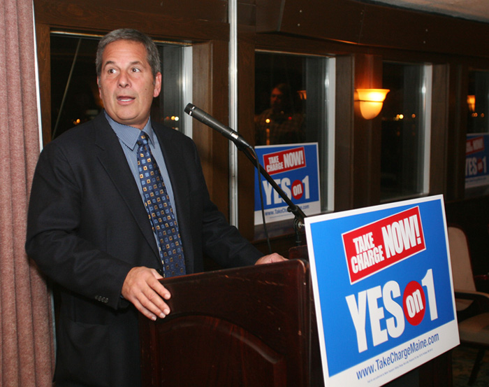 Steve Barber, president of Black Bear Entertainment, welcomes guests during the Yes on 1 Four Season Resort and Casino reception at DiMillos Floating Restaurant in Portland this evening.