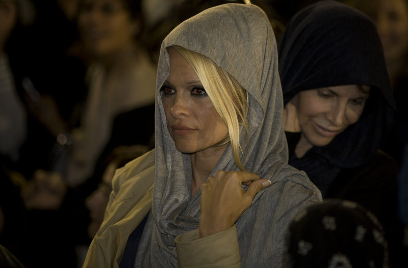 U.S. actress Pamela Anderson visits Jerusalem’s Western Wall on Sunday. An honorary PETA director, she praised Israel for having no fur farms.