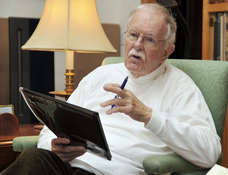 Roberts Manns holds a copy of the program for his play “Yorktown,” which was presented last summer by the Drama Garden at the Abingdon Theatre in New York.