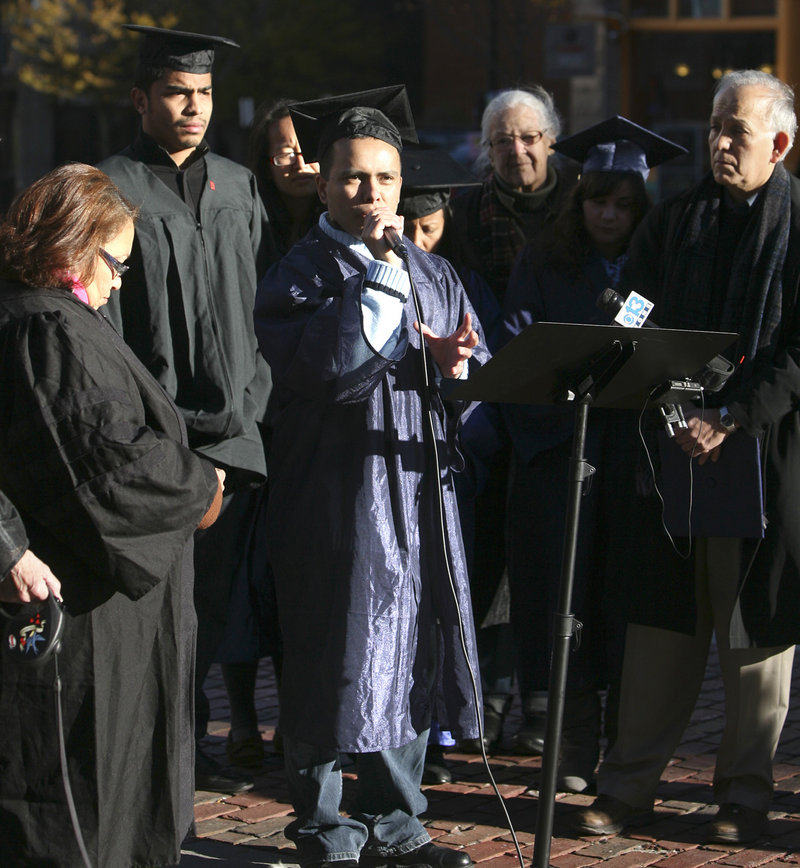 Selvin Arevalo of Portland, an immigrant from Guatemala, addresses the crowd during a rally for undocumented youths at Monument Square in Portland on Thursday. “I’m here,” Arevalo said. “But I’m still in the deportation process.”