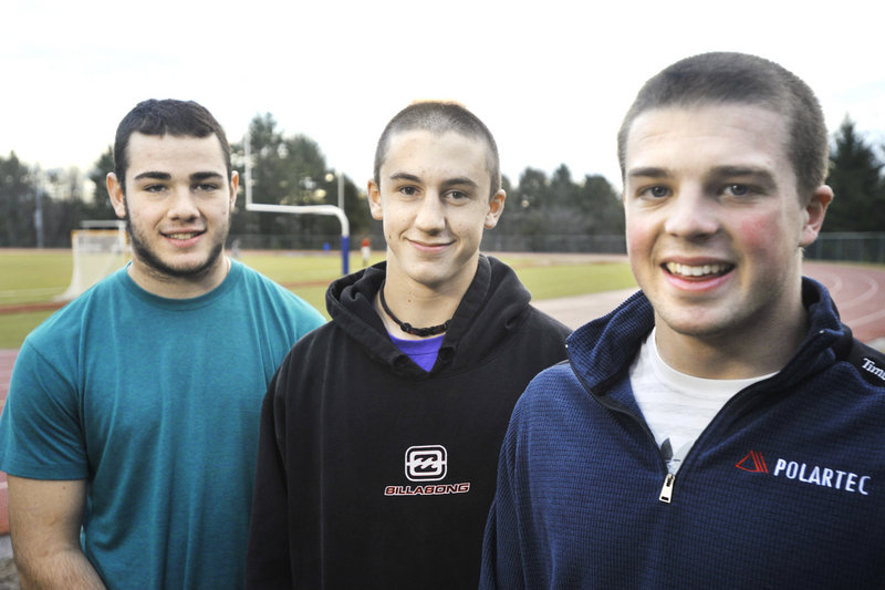 From left, Nick Proscia, Tommy O'Toole and Billy Clabby are among the leaders on a Yarmouth defense that has held opponents to 25 points in three playoff games.