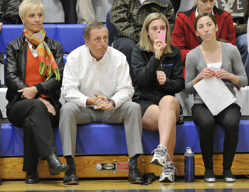 Abbey Leonardi, far right, was honored at an assembly Tuesday at Kennebunk High after being named October Athlete of the Month by a national coaches association. Seated with her, from left, are parents Lynda and Jack Leonardi, and her sister, Sydney.