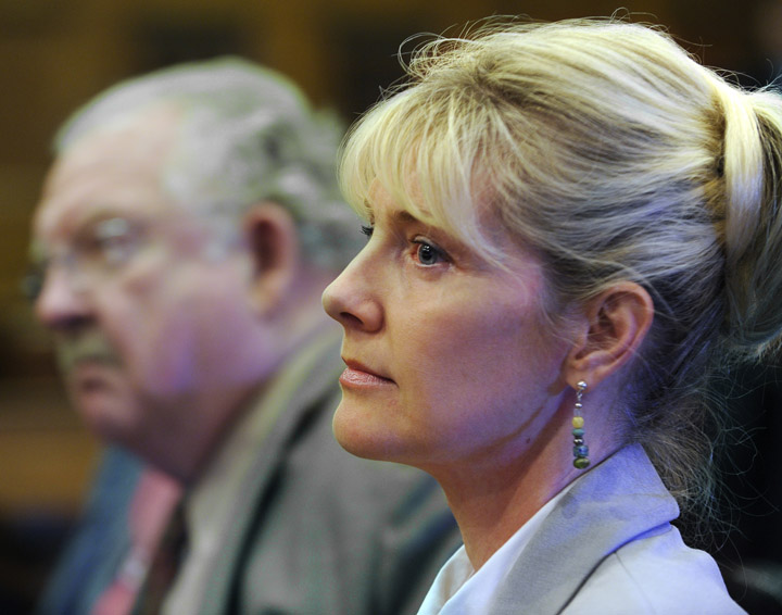 In this May 11 photo, Linda Dolloff shows little emotion as the jury is polled and all pronounce her guilty on all three counts in her attempted murder trial of her husband Jeffrey Dolloff. Next to her is Dan Lilly, her attorney.