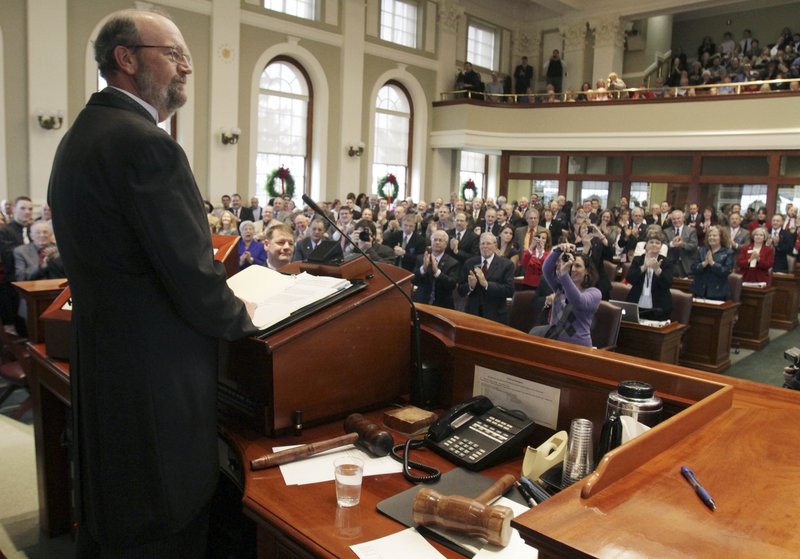 Newly elected House Speaker Robert Nutting, R-Oakland, receives a warm welcome from members of the 125th Maine Legislature after being sworn into office at the State House on Wednesday.