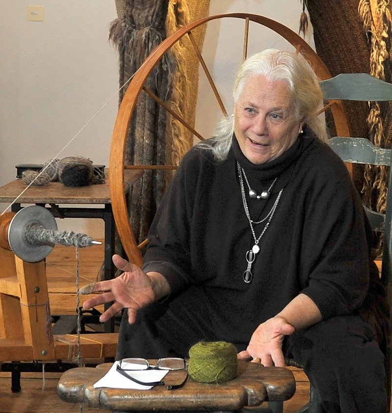 Katharine Cobey chats with a visitor at her studio in Cushing.