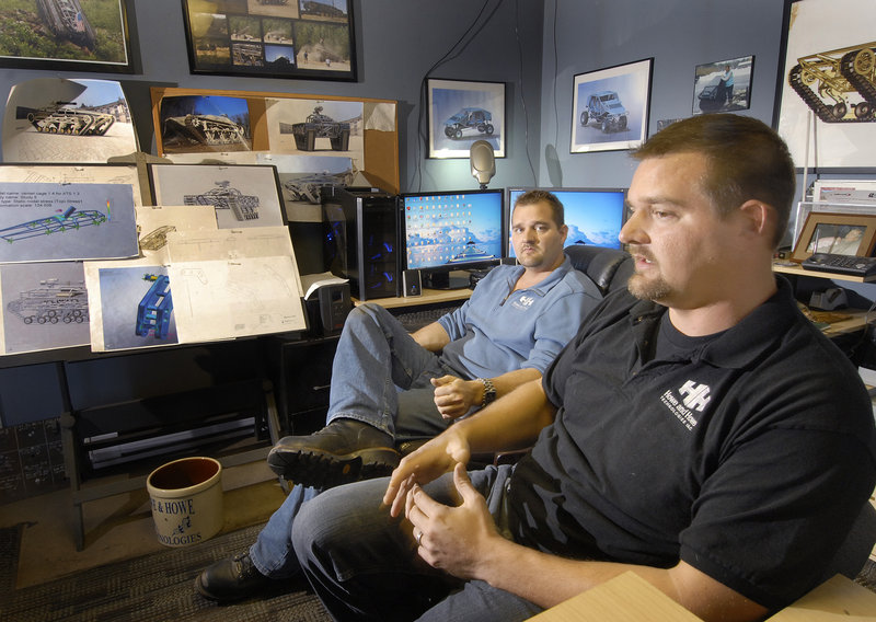 Michael Howe, in back, and Geoff Howe decided to build the rugged Ripchair after getting an e-mail from a disabled veteran who wanted a chair that would allow him to fish in the woods.