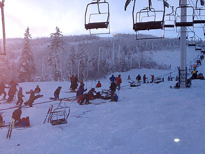 Some chairs lie on the ground while others are suspended in the air after the Spillway East lift derailed Tuesday morning at Sugarloaf. About 150 people were stranded when the 4,000-foot-long chairlift stopped and had to be lowered to the ground by ropes, a resort official said.