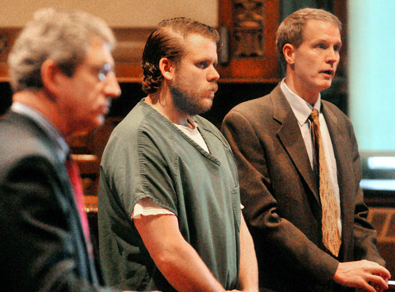 Peter George Bathgate II, center, is framed by Deputy Attorney General William R. Stokes, left, and Bathgate's defense attorney J. Mitchell Flick this morning in Kennebec County Superior Court in Augusta. Bathgate pleaded not guilty to a charge of murdering Paul Allen on Dec. 3, 2010.
