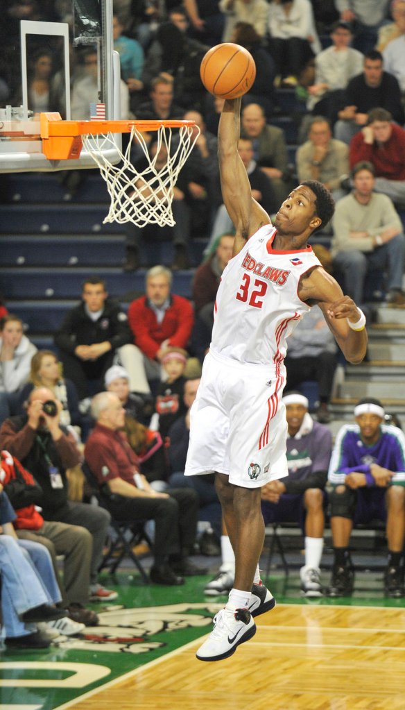 It's clear sailing for DeShawn Sims of the Maine Red Claws, who goes in for a dunk after stealing the ball at midcourt during the 99-95 victory against the Dakota Wizards.