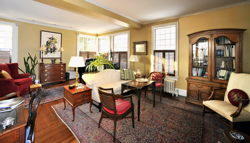 The living room, bathed in afternoon sunlight, of the Story home.