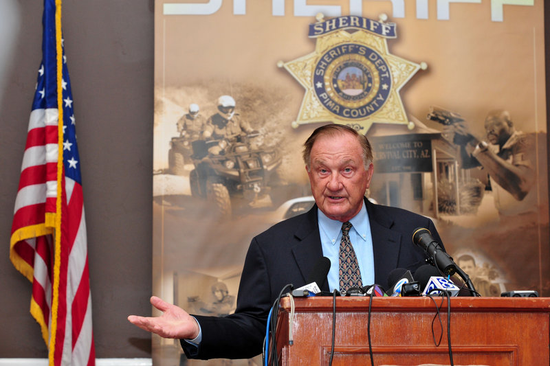 Pima County Sheriff Clarence Dupnik speaks at a news conference Saturday in Tucson, Ariz., after Rep. Gabrielle Giffords was shot in the head by a gunman who opened fire during a meeting with voters, killing a federal judge and five others in a rampage that rattled the country and left politicians fearful for their safety.