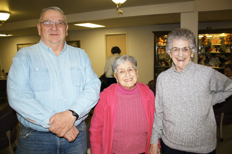 John Pettengill, who drives the Woods at Canco shuttle, Lonnie Norton and Louise Standley.