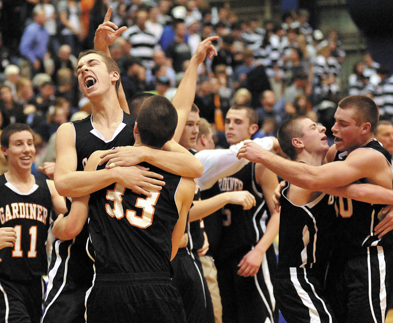 GOOD MOMENT: Gardiner celebrates after a 57-44 win against Presque Isle in the Eastern Maine Class B quarterfinals Friday night at the Bangor Auditorium.