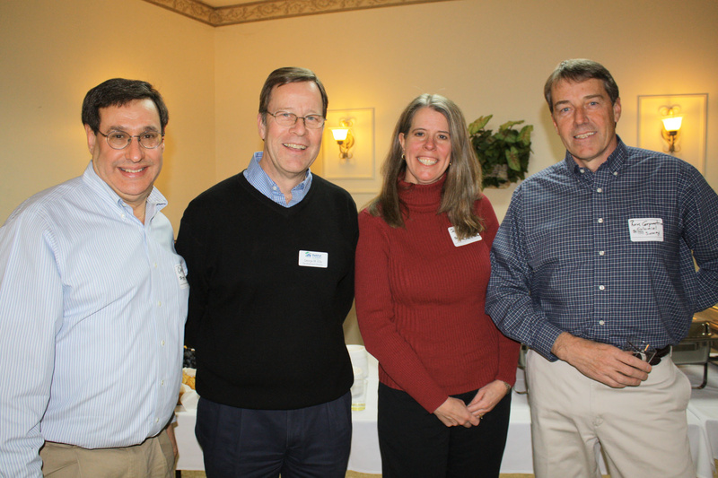 Gary Koocher, of Applicators Sales & Service, George Ellis, of Habitat for Humanity, and Jeanne and Ron Carpentier, of Colonial Surveying Co.