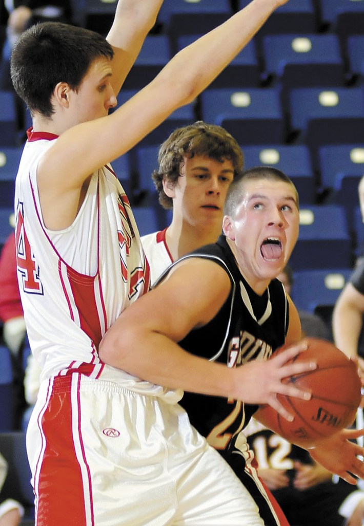 BACK TO BANGOR: Kaleb Smith, right, and the Gardiner boys basketball team will play in the quarterfinals for the first time since 2007 when they face Presque Isle tonight in Bangor.