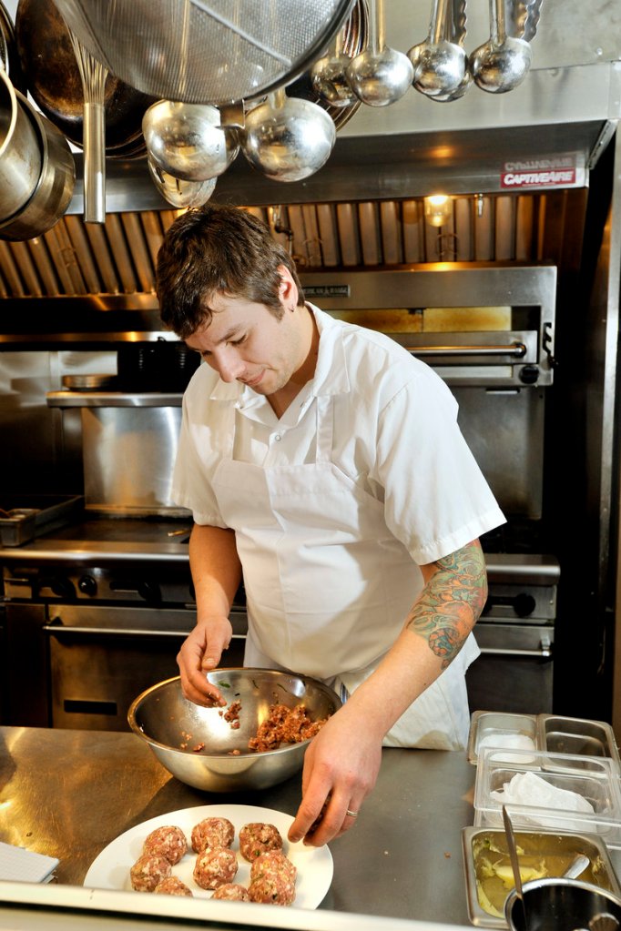 Pete Sueltenfuss of District works up a batch of his pork meatballs.