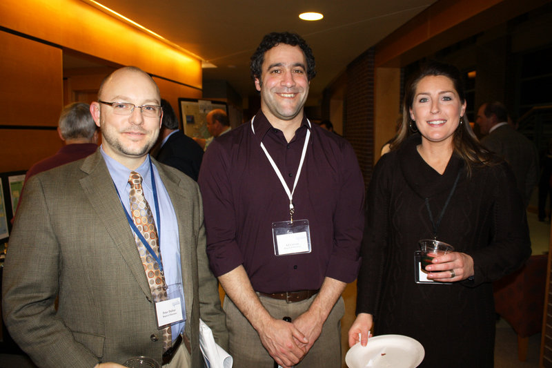 Board member Peter Dufour, board member AJ Curran and volunteer Kelly Dufour.