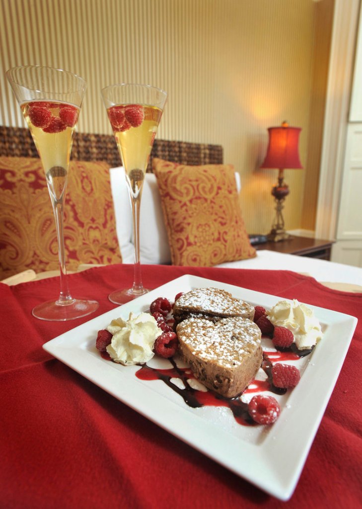 Dana Moos’ Chocolate Ricotta Pancakes in a family-friendly version with chocolate sauce, raspberry coulis and whipped cream.