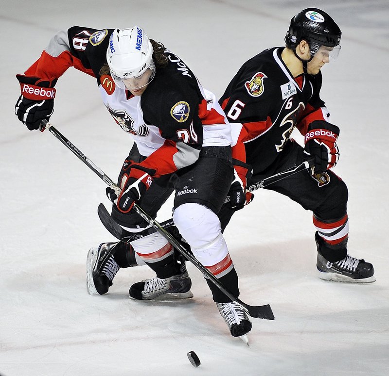 Dennis McCauley, left, came to the Pirates with a reputation as a so-called tough guy, but he’s proven to be much more than just a fighter. He already has surpassed his point total last year with Worcester ... with 28 games to play.