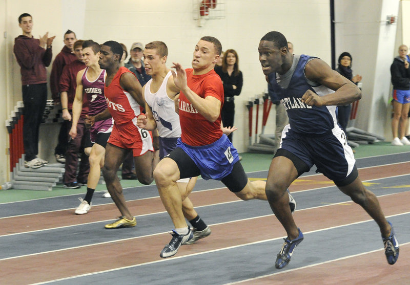 McKenzie Gary, second right, of Mt. Ararat, edges Portland’s Imadhi Zagon, right, to capture the 55-meter dash in 6.62 seconds. Zagon was timed in 6.64 seconds.