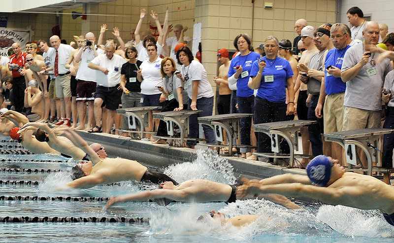 With timers watching their marks and swimmers making their starts, the Class A boys’ state meet got under way with the 200-yard medley relay on Tuesday at Bowdoin College’s Greason Pool.