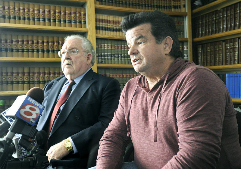 Attorney Daniel Lilley, left, and Kaile Warren appear at a news conference Wednesday at Lilley’s law office in Portland. Lilley said Warren was a victim of legal malpractice. “He was following their advice to the ‘T,’ right off the cliff,” Lilley said.