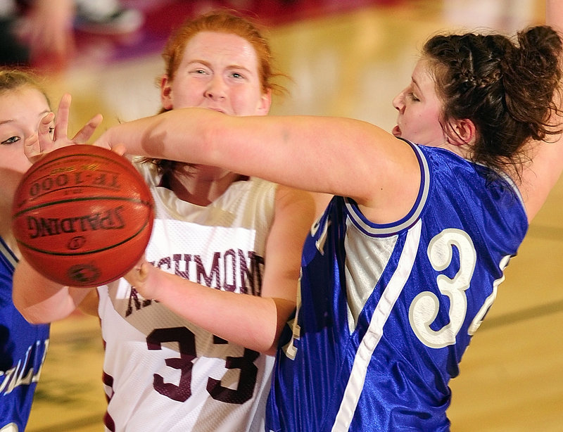 Ashley Hines, right, of Valley knocks the ball away from Alyssa Pearson of Richmond during the Western Class D final. Richmond advanced to the state championship game with a 42-38 victory.