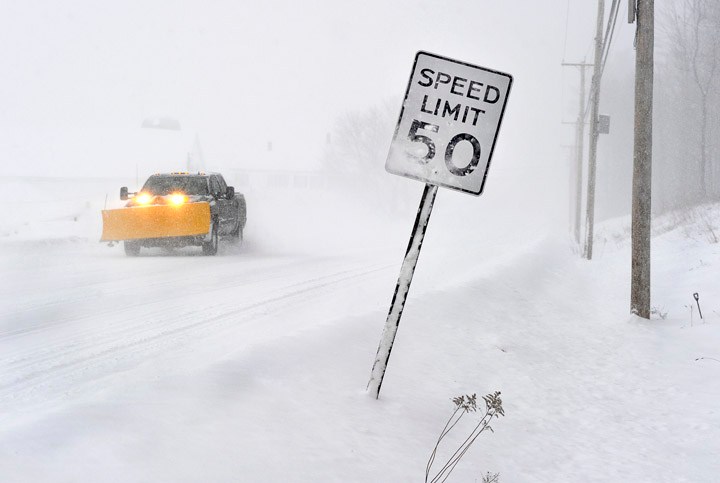 Near white-out conditions and heavy snowfall make for dicey driving conditions this morning on Route 114 in Gorham.