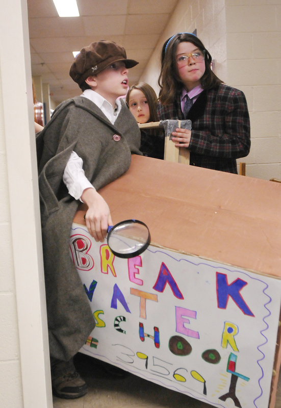 Students from Breakwater School in Portland wait to perform during Le Tour Guide. From left are Ike Wilson, 10, Tova Kemmerer, 8, and Dora Chaison-Lapine, 9.