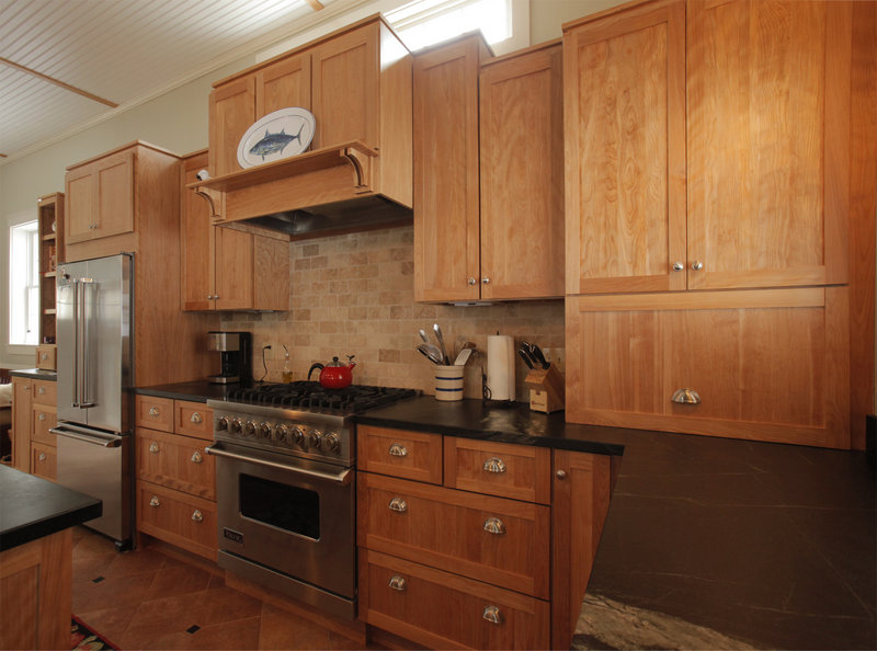 The Beans renovated the kitchen using lots of beautifully stained wood.