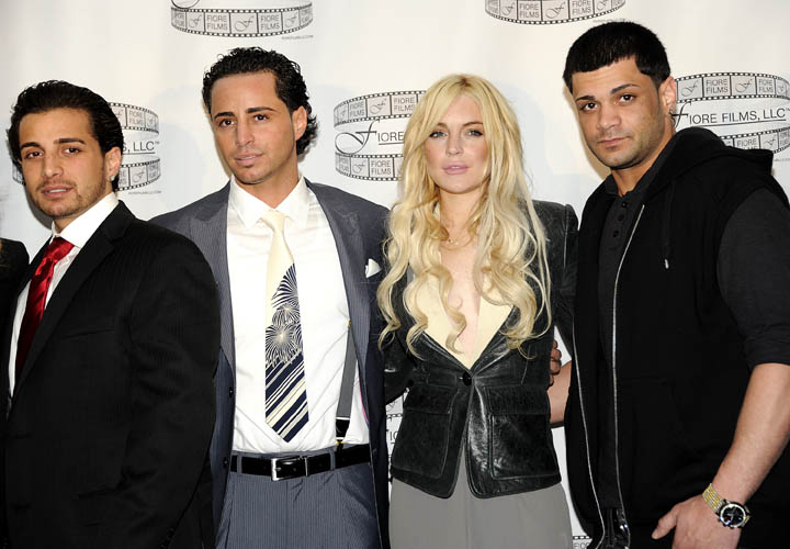 From left, Carmine Gotti Agnello, John Gotti Agnello, Lindsay Lohan and Frank Gotti Agnello attend a press conference for the film 'Gotti: Three Generations' at The Sheraton Hotel on Tuesday, April 12, 2011 in New York. (AP Photo/Evan Agostini) Half-Length