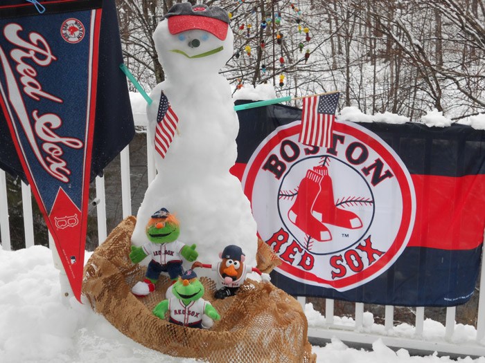 Diane Stone of Kennebunk didn't let the storm interfere with her celebration of Opening Day for the Red Sox (they're playing the Texas Rangers this afternoon.) Go Sox!
