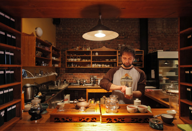 Kevin Marcello prepares two Ceylon teas from Sri Lanka at Dobra Tea in Portland.