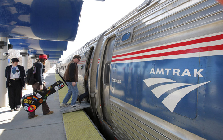 Passengers board the Downeaster train in Portland in this March 2009 photo.