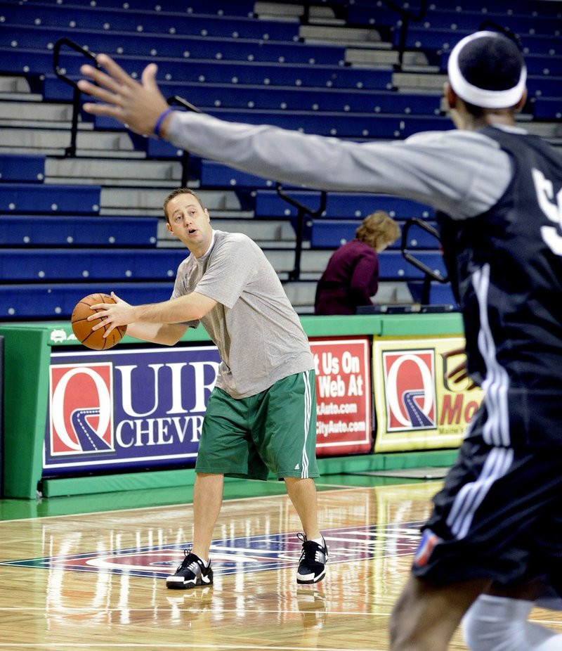 Austin Ainge, assisting at practice.