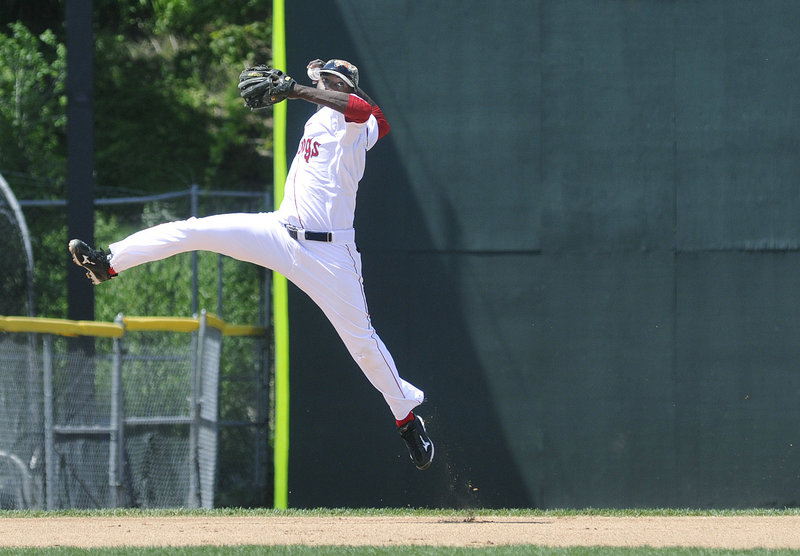 Vladimir Frias, the shortstop for the Portland Sea Dogs, gets an opportunity to show off his arm Monday while making a leaping throw to first base during the Memorial Day game against the Trenton Thunder at Hadlock Field. Trenton rallied for a 6-4 victory.