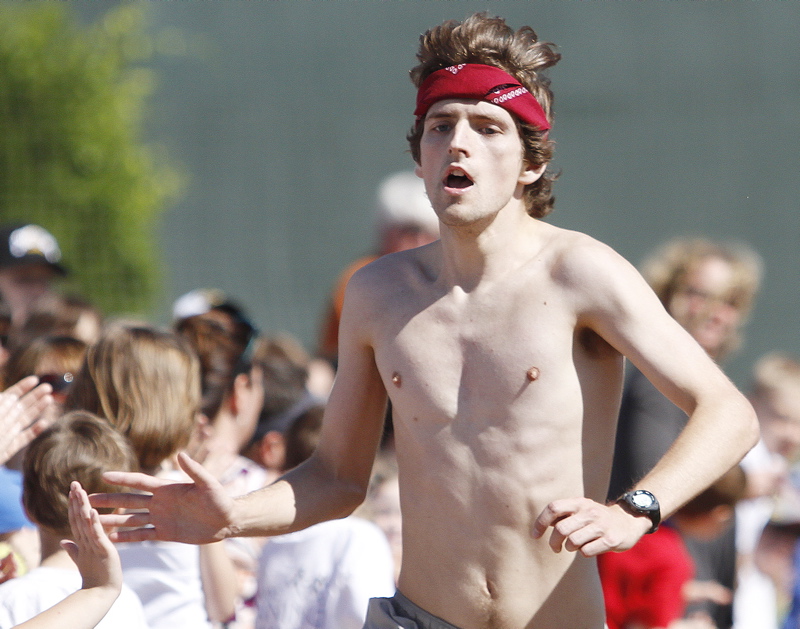 Chris Harmon of Scarborough wins today's Portland Sea Dogs Father's Day 5K road race in 15 minutes, 43 seconds.