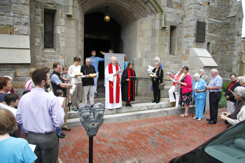 The Revs. Robert Witham and Deborah Davis-Johnson, center, lead the litany before the congregations of Immanuel Baptist Church and Williston-West United Church of Christ merge to become Williston-Immanuel United Church in Portland on Sunday.