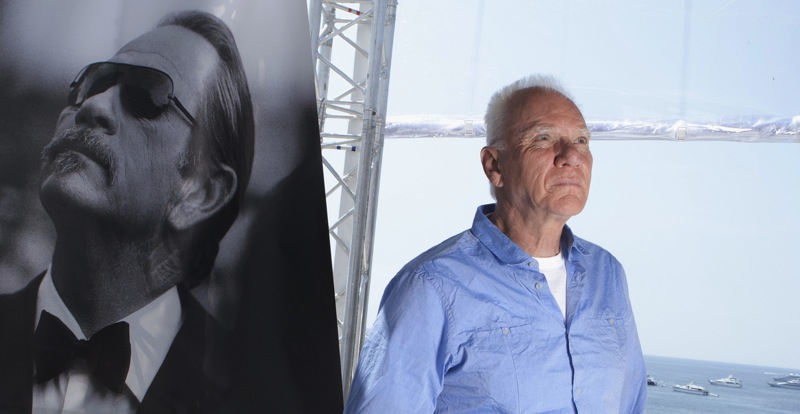 Actor Malcolm McDowell poses for photos during an interview with the Associated Press at the 64th international film festival, in Cannes, southern France, Thursday, May 19, 2011. (AP Photo/Joel Ryan) X2011CAN1