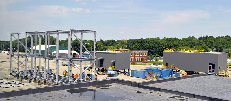 Three modules built for a mining company are shown in various stages of completion at Cianbro’s Brewer location.