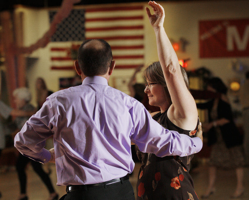 Dorothy Smail of Stockholm dances the "Swing" with George Healy of Sidney at Maplewood Dance in Portland.